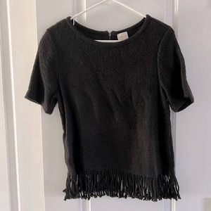 Chico’s black top with fringe on the bottom